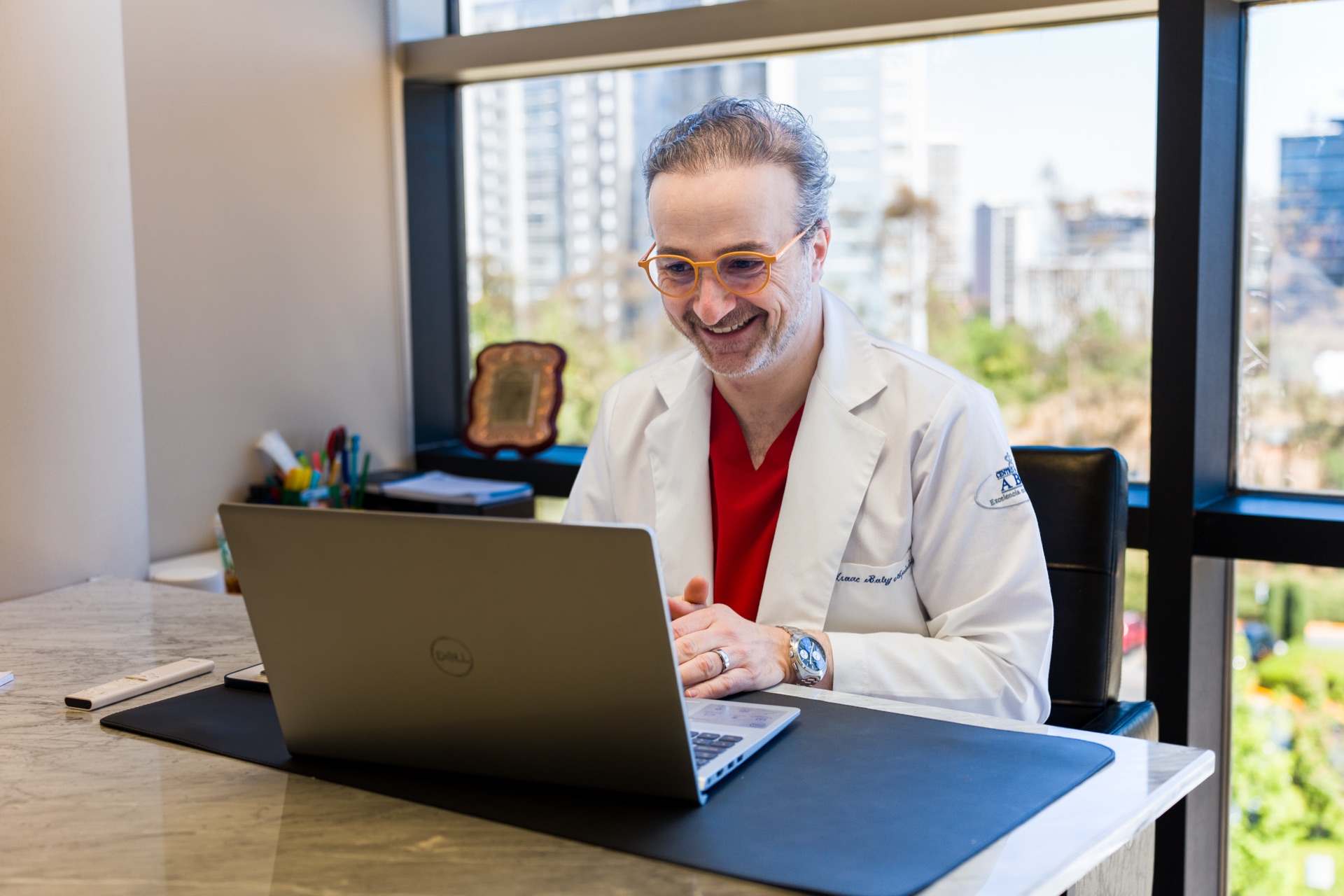 Dr. Isaac Baley during a video consultation